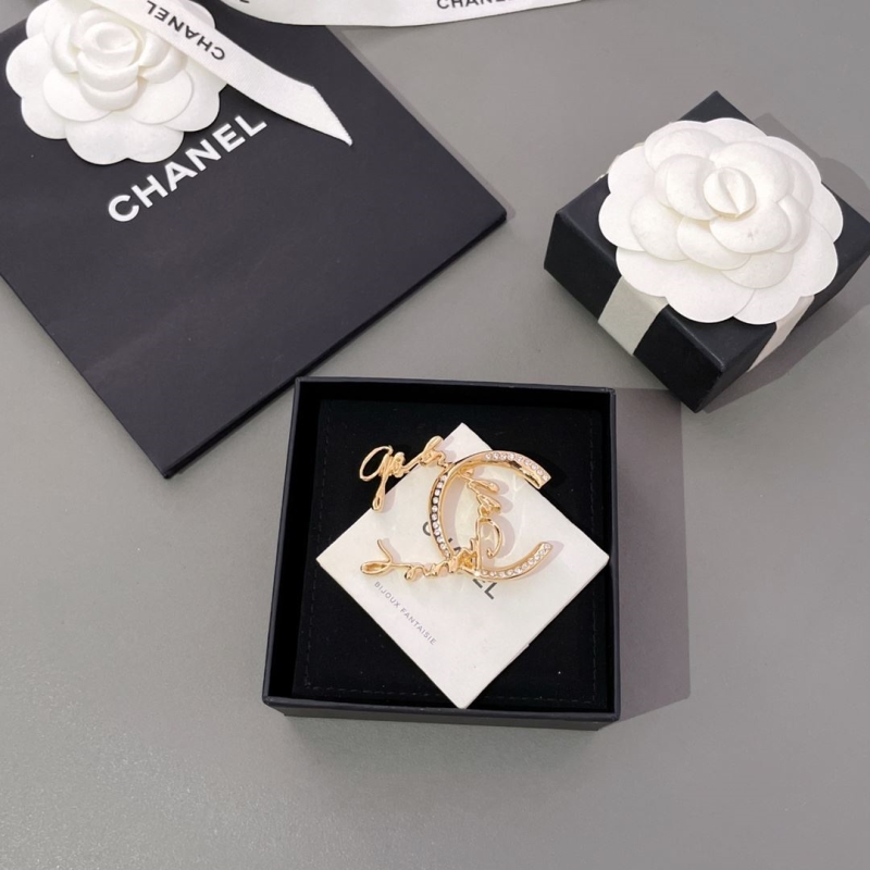 Ch*el brooches